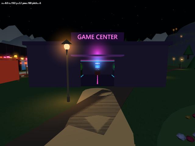 夜のスポーン地点の南に建つ、ネオンの看板「GAME CENTER」のゲームセンターの外観
